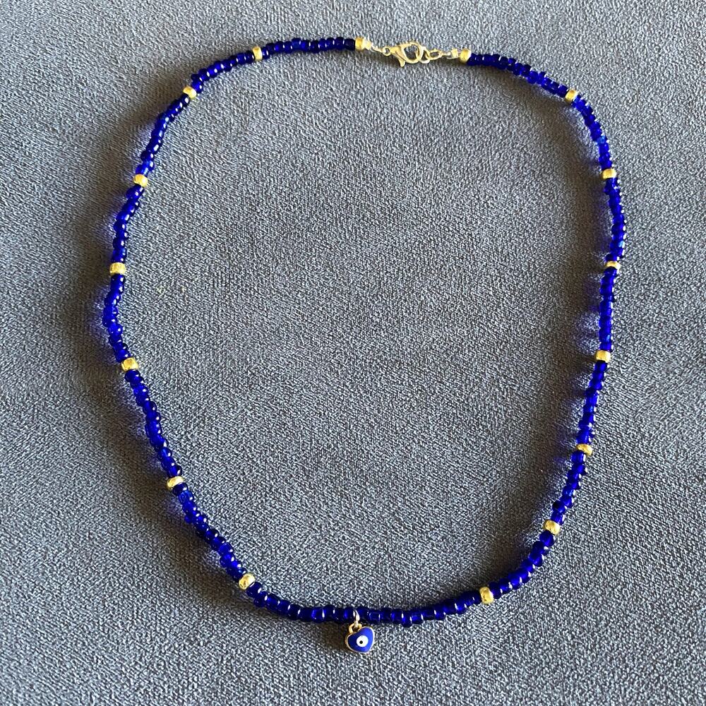 Beaded evil eye heart charm necklace